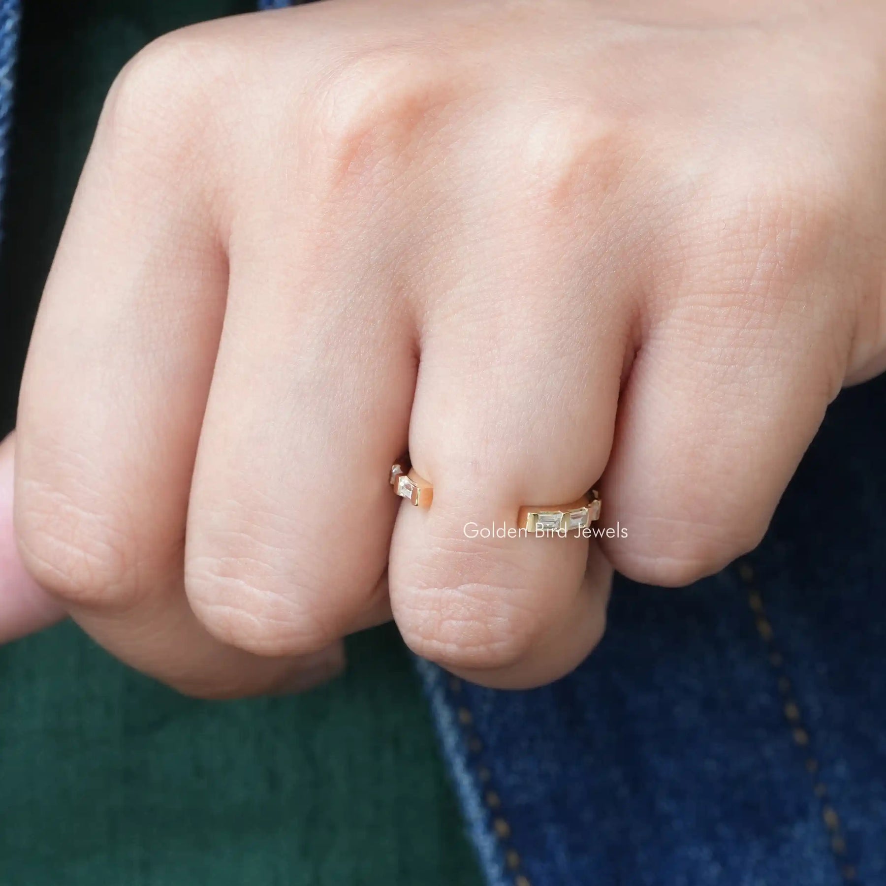 [In finger front view of colorless baguette cut moissanite band]-[Golden Bird Jewels]