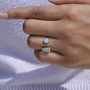 Close view of moissanite ring in secure setting 
