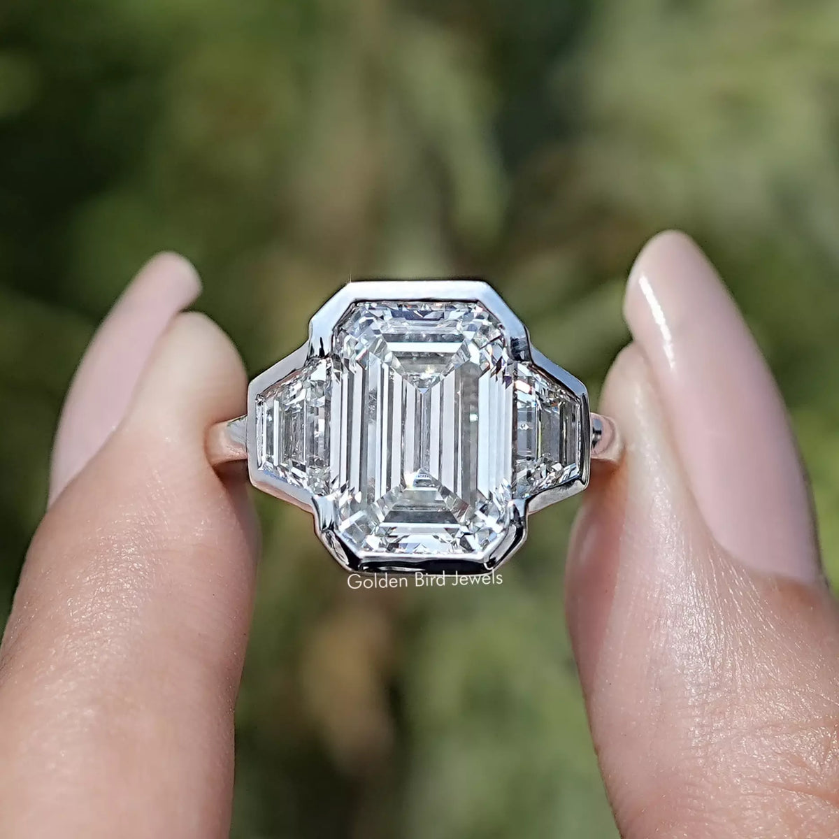 Bezel Set Emerald Cut Lab Diamond Three Stone Ring