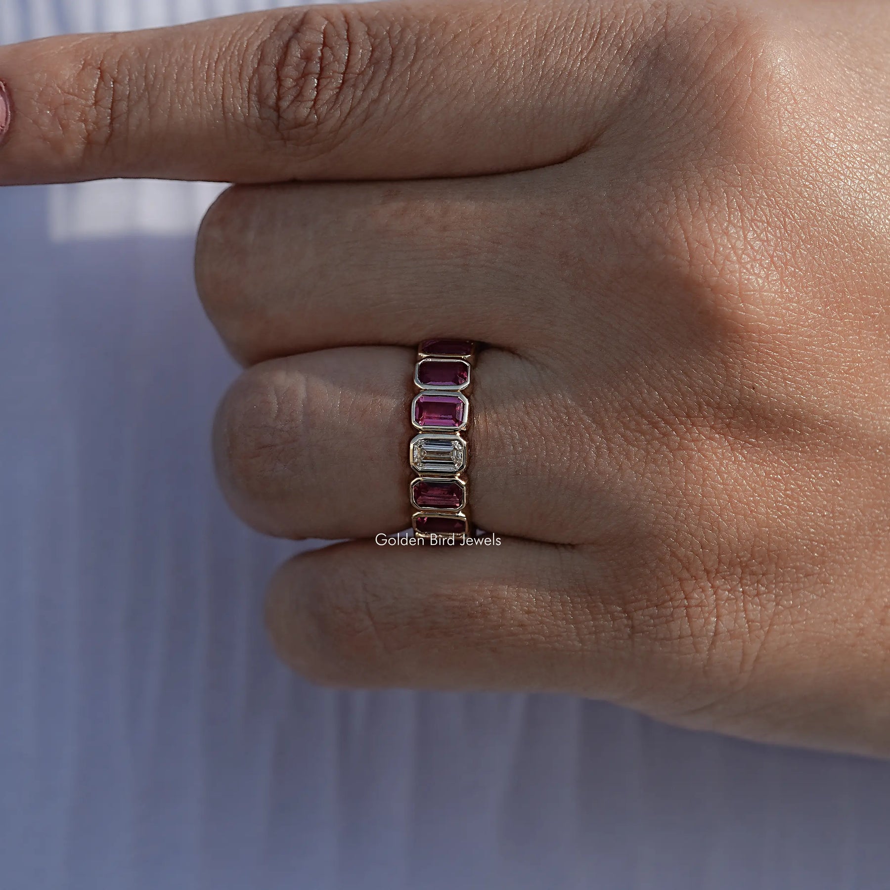 Bezel Set Emerald Gemstone Eternity Band