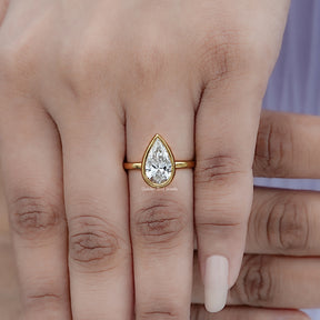 Bezel Set Pear Cut Lab Diamond Solitaire Ring