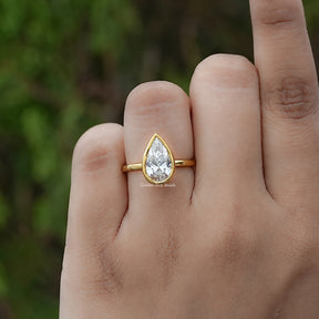 Bezel Set Pear Cut Lab Diamond Solitaire Ring