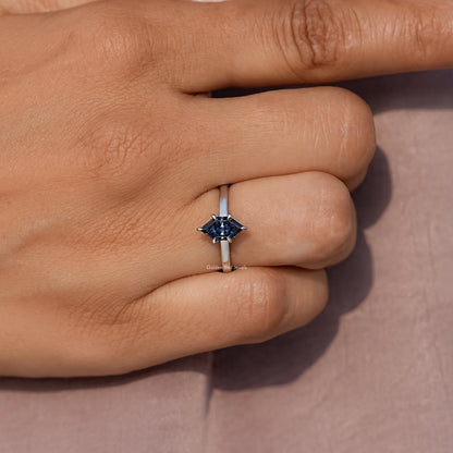 Prong-set blue marquise-cut moissanite ring on silver band