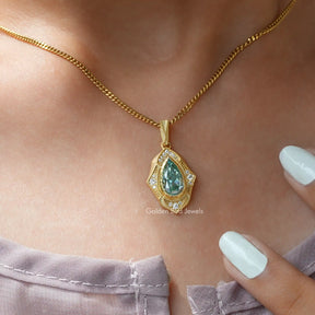 moissanite pendant crafted in  yellow gold and round cut side stones