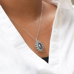 In front view of moissanite pear cut pendant