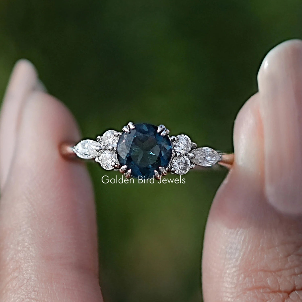 Front view of Blue Topaz Round Gemstone Accent Stone Ring
