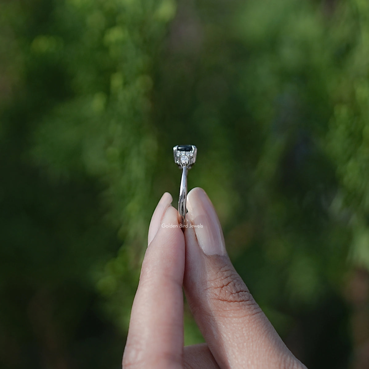 Side View of Blue Topaz Round Gemstone Accent Stone Ring