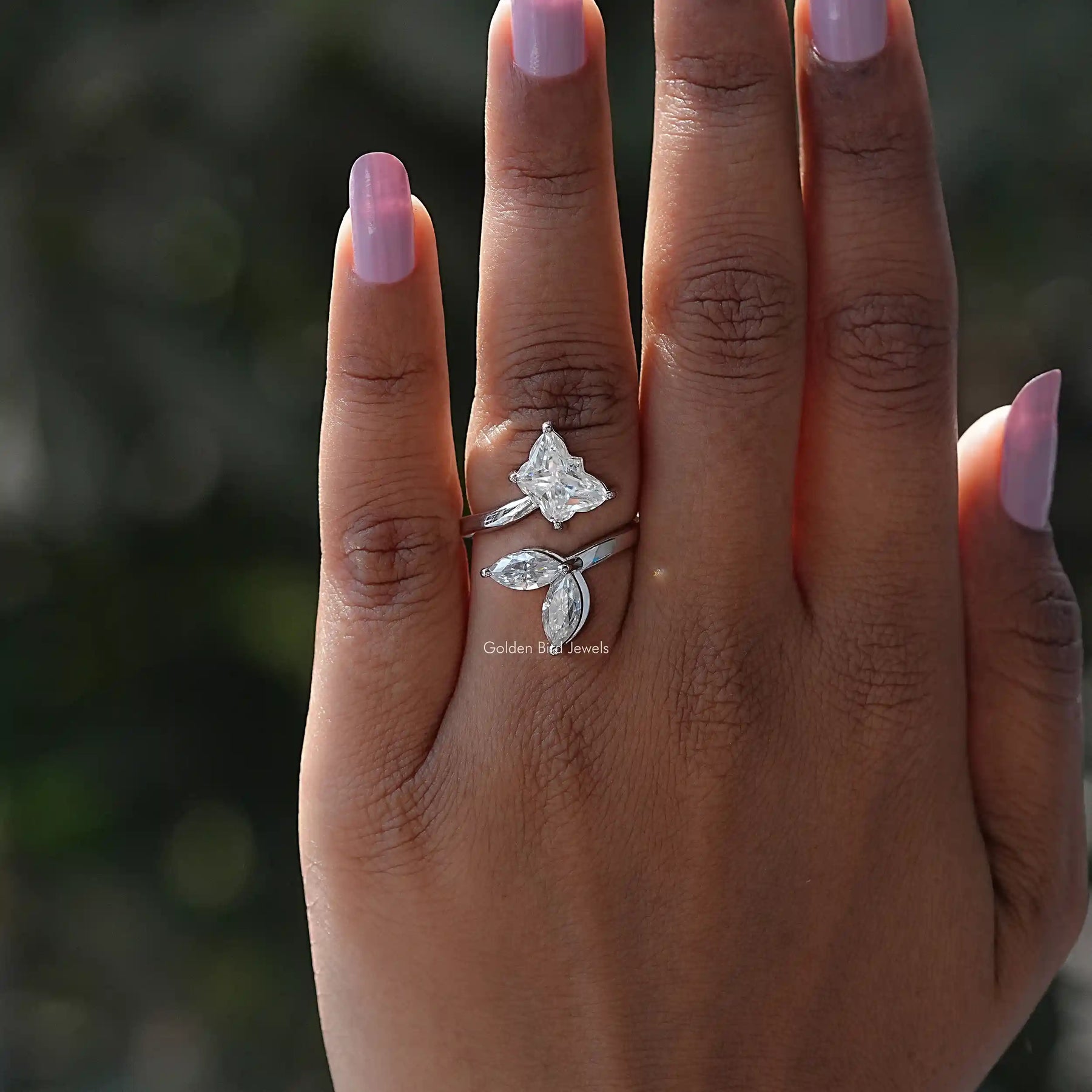View of Butterfly Cut Moissanite Bypass Ring In White Gold