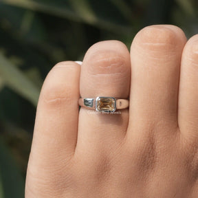 View of Bezel Set Criss Cut Moissanite Ring In finger