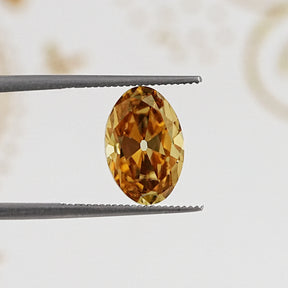 In Tweezer View Of Old Mine Oval Cut Loose Moissanite Stone