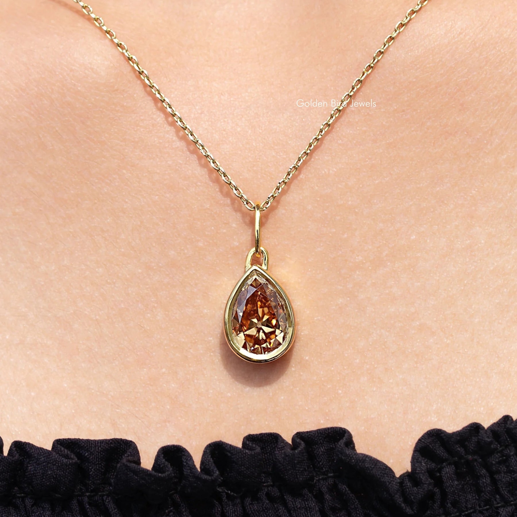 In neck View Of Old Mine Pear Moissanite Pendant