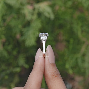 Side View of Old Mine Cushion Three Stone Moissanite Ring