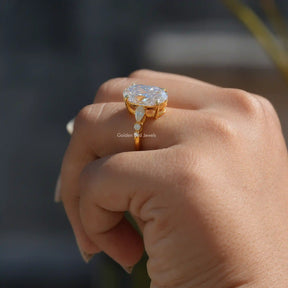[In finger side view of oval cut cluster engagement ring]-[Golden Bird Jewels]