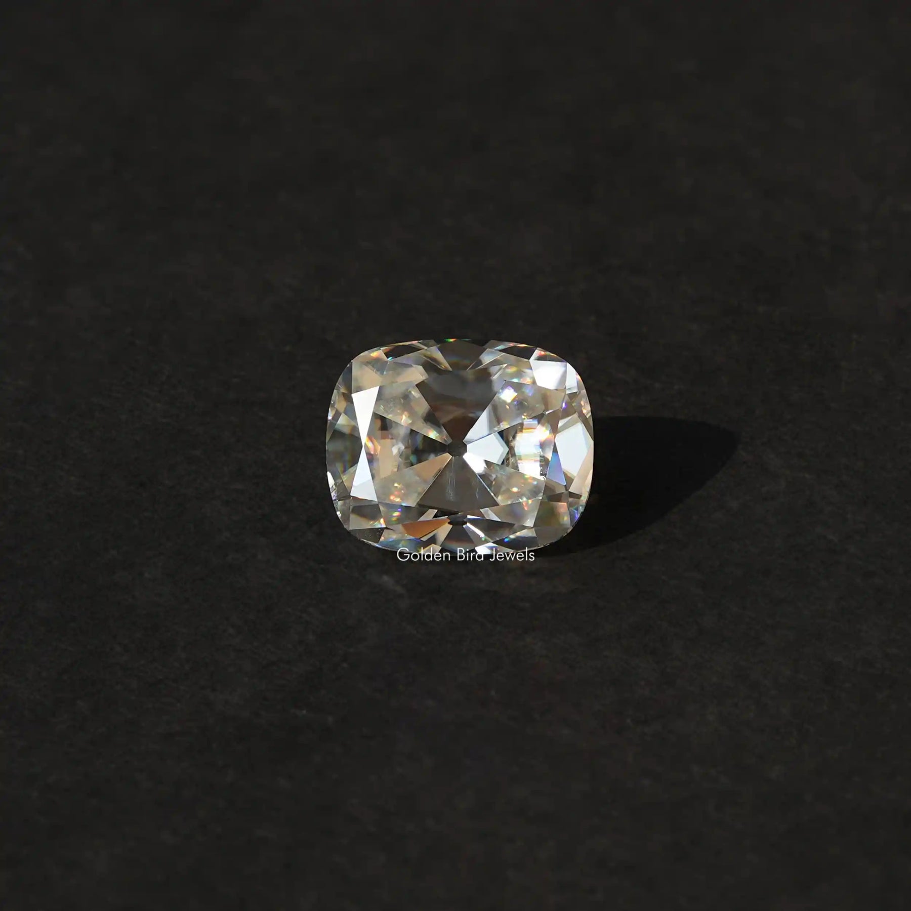 [Front view of colorless cushion cut loose moissanite stone]-[Golden Bird Jewels]