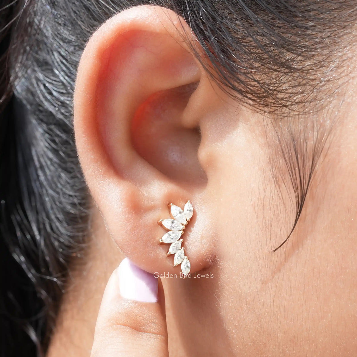 [In ear front view of colorless marquise moissanite stud earrings]-[Golden Bird Jewels]