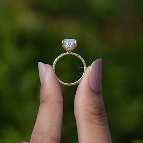 Back View of Crushed Ice Oval Moissanite Solitaire Ring In two fingers