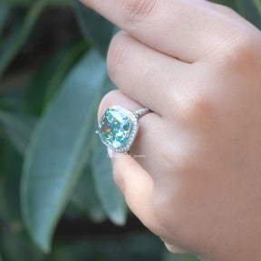 View of Blue Cushion Cut Moissanite Halo Engagement Ring In White Gold