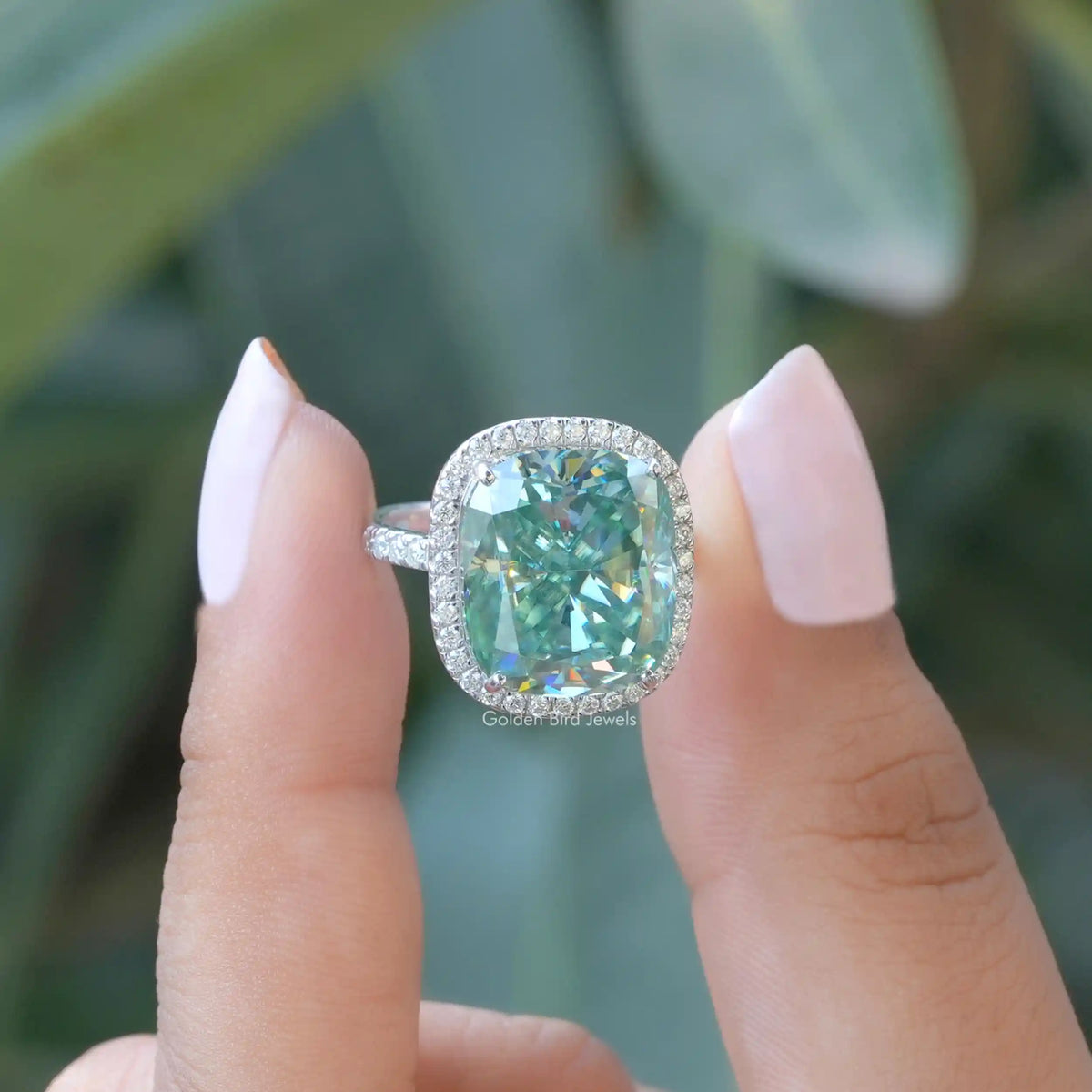 Front View of Cushion Cut Moissanite Halo Ring In two Fingers