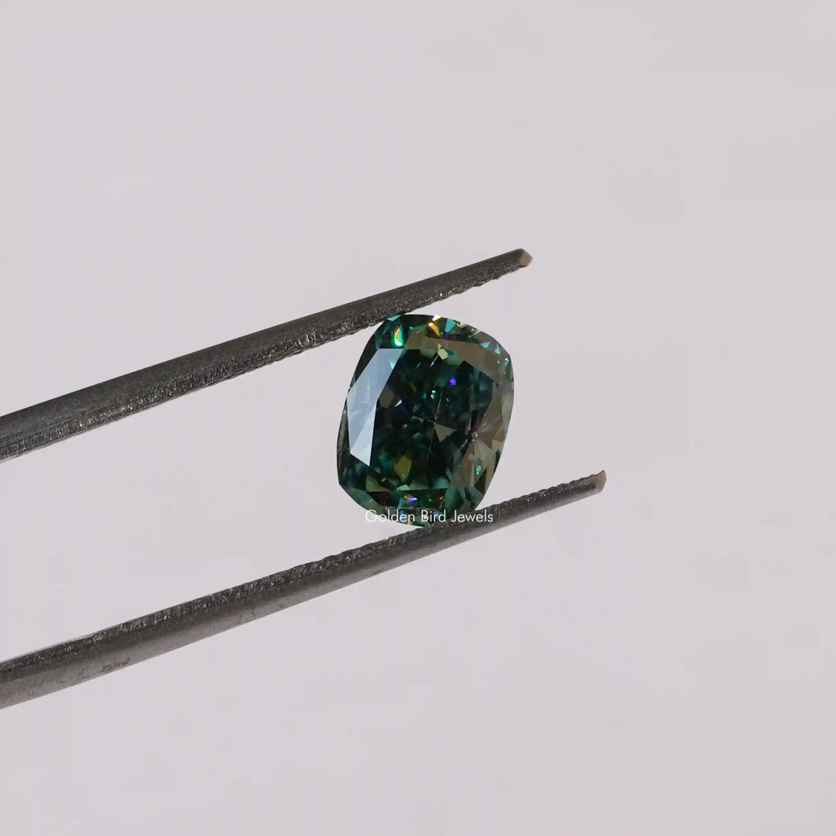 In Tweezer View Of Moissanite Cushion Cut Loose Stone