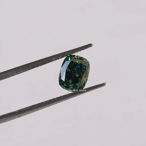 In Tweezer View Of Moissanite Cushion Cut Loose Stone