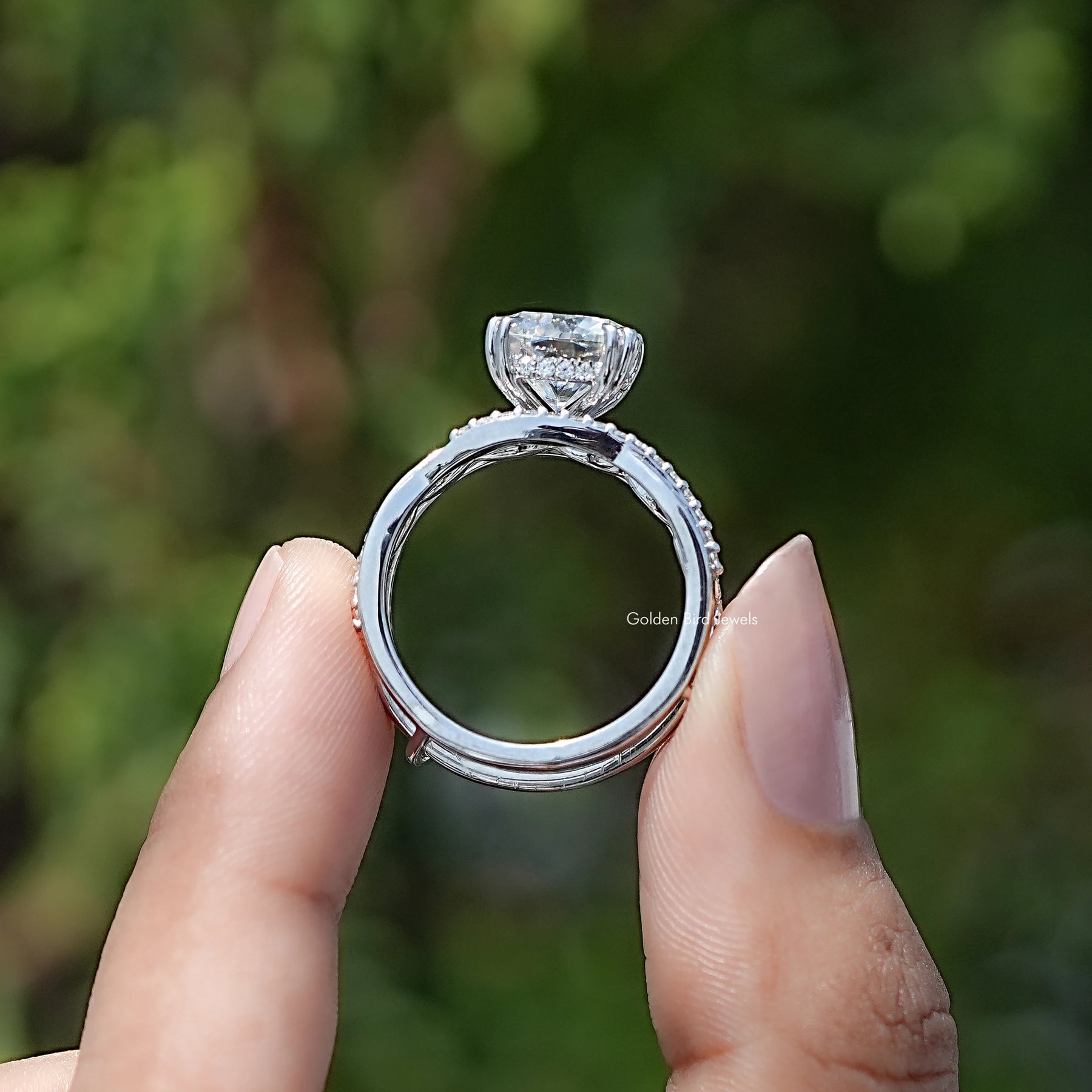 Back view of Cushion Cut Moissanite Accent Bridal Ring Set in secure setting 