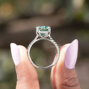 Back View of Moissanite Cushion Cut Hidden Halo Ring In two fingers