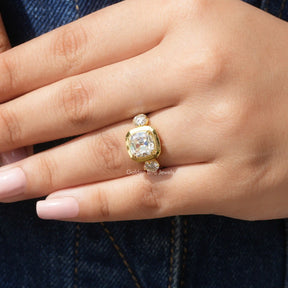 [In finger front view of old mine cushion cut three stone engagement ring]-[Golden Bird Jewels]