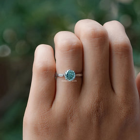Front View of Blue Portuguese Round Cut Moissanite Ring In White Gold