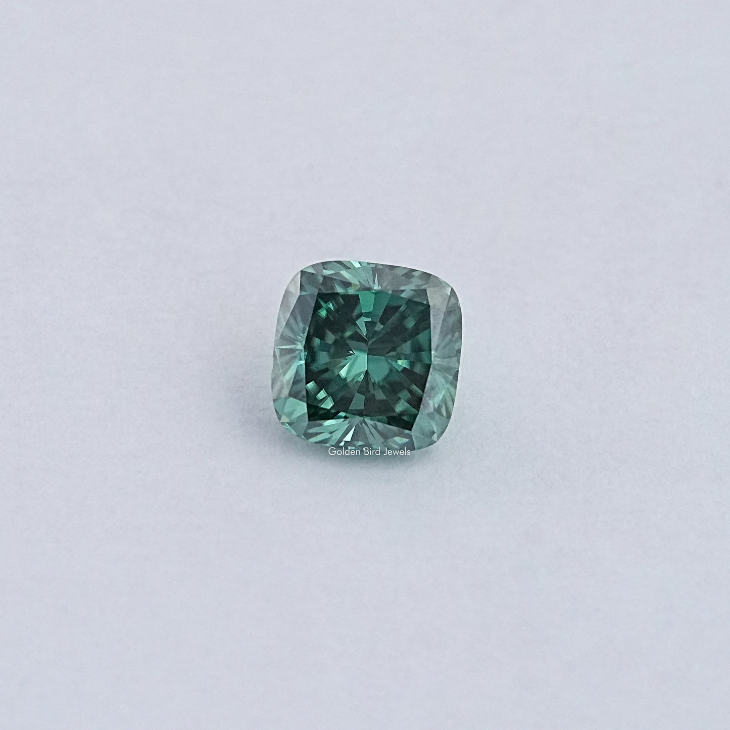 View Of Dark Green Cushion Cut Loose Moissanite 