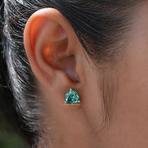 In Ear view of trillion Cut moissanite Stud Earrings 