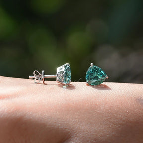 Front and back view of dark green moissanite ear studs 