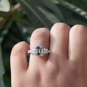 [in finger front view of criss cut moissanite engagement ring set in double prongs]-[Golden Bird Jewels]