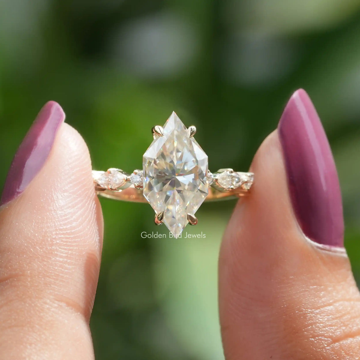 Front view of dutch marquise cut moissanite engagement ring made of four prongs