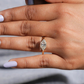 Marquise Moissanite East West Solitaire Ring In Yellow Gold