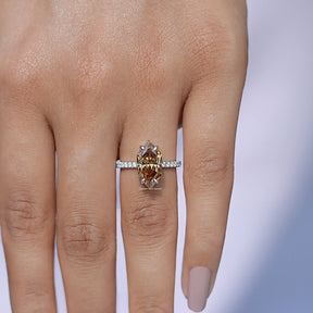 Close view of Marquise cut mossainate ring in White side diamonds 