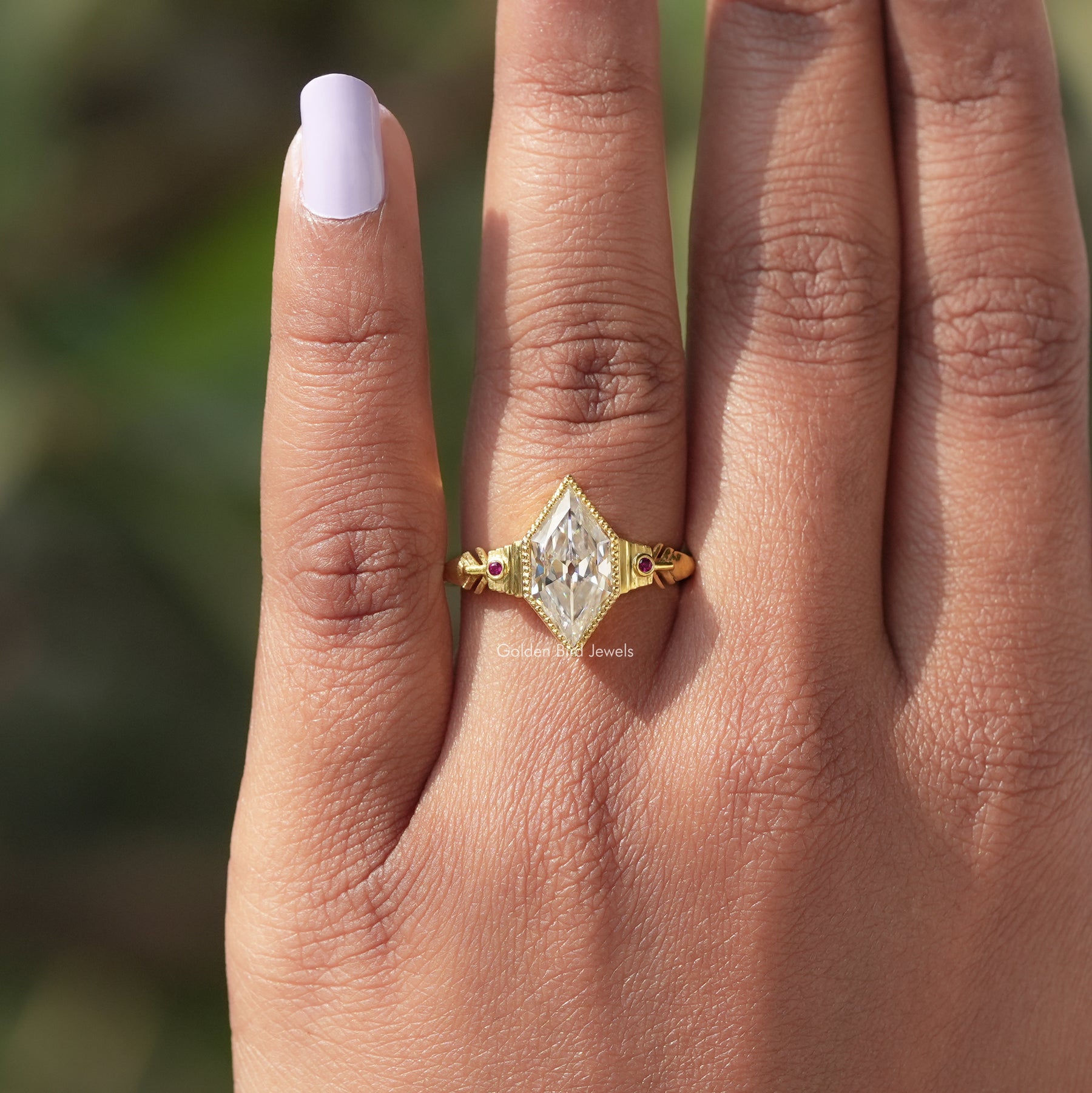 [In finger front view of marquise cut moissanite ring made of VVS clarity]-[Golden Bird Jewels]