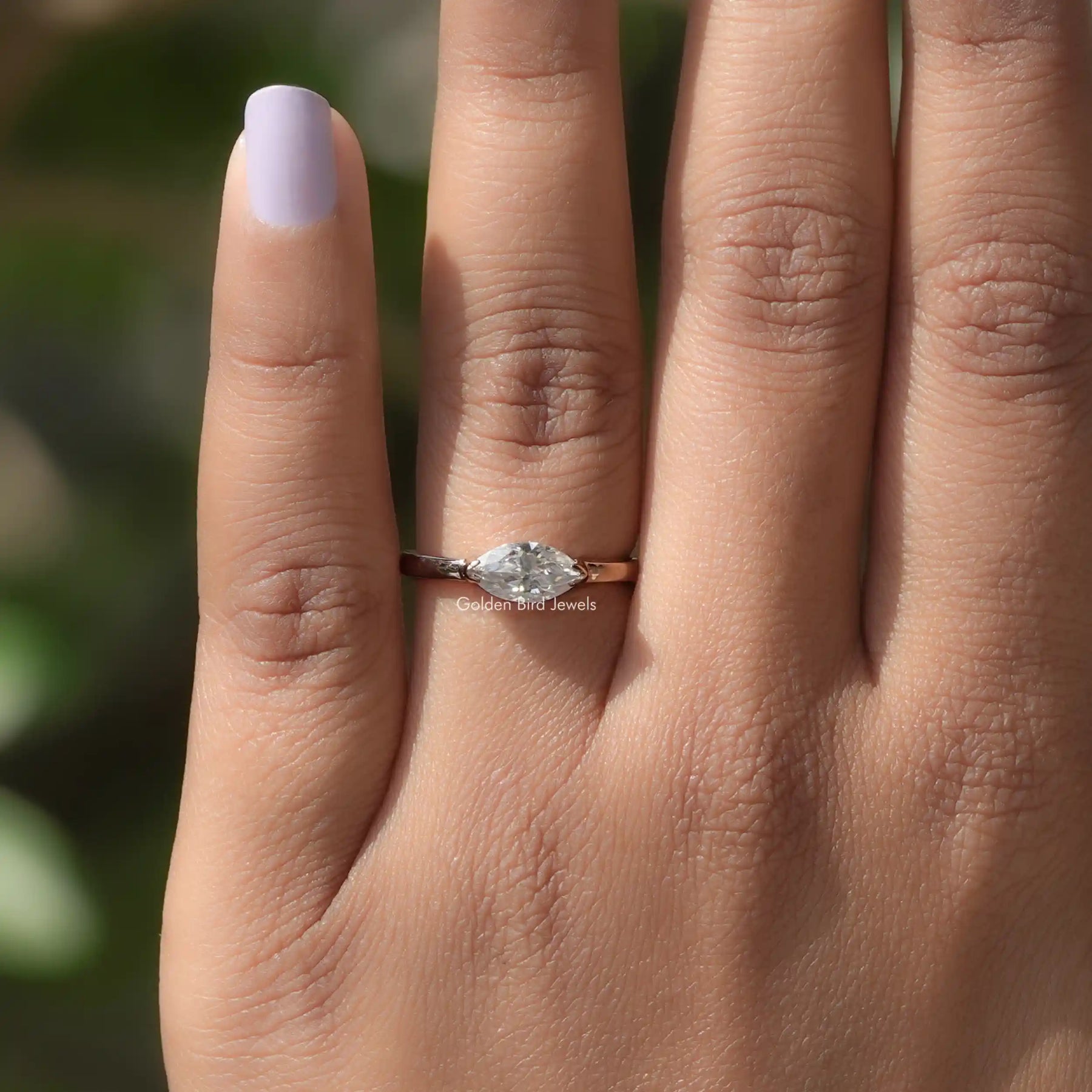 East West Marquise Solitaire Engagement Ring