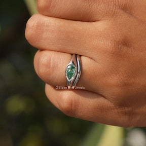 Close-Up View of Pear Cut East West Solitaire Ring In White Gold