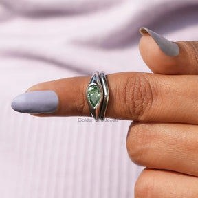 In finger front View of Pear Cut Moissanite Solitaire Ring
