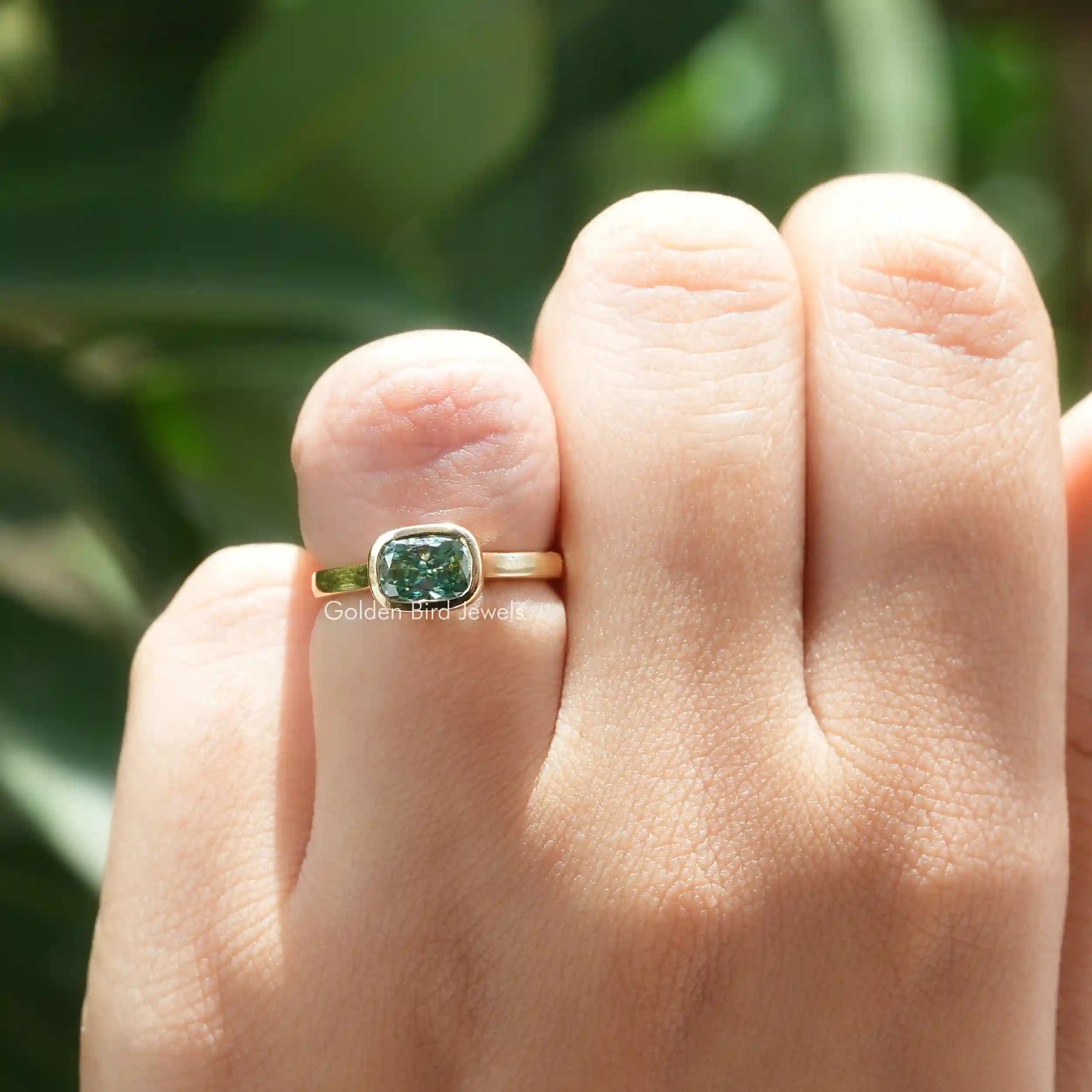 [In Finger a Blue-Green Elongated Cushion Moissanite Engagement Ring]-[Golden Bird Jewels] 