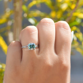 [In Finger Front View of a Blue-Green Elongated Cushion Cut Moissanite Engagement Ring]-[Golden Bird Jewels]
