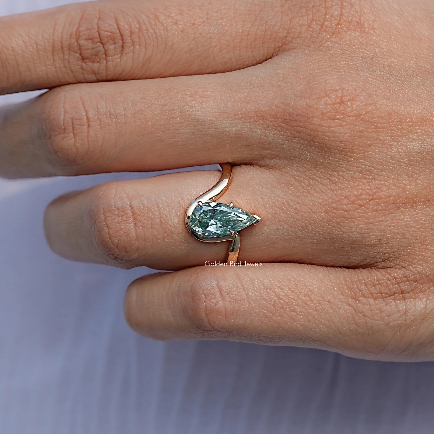 Elongated Pear Moissanite Solitaire Ring