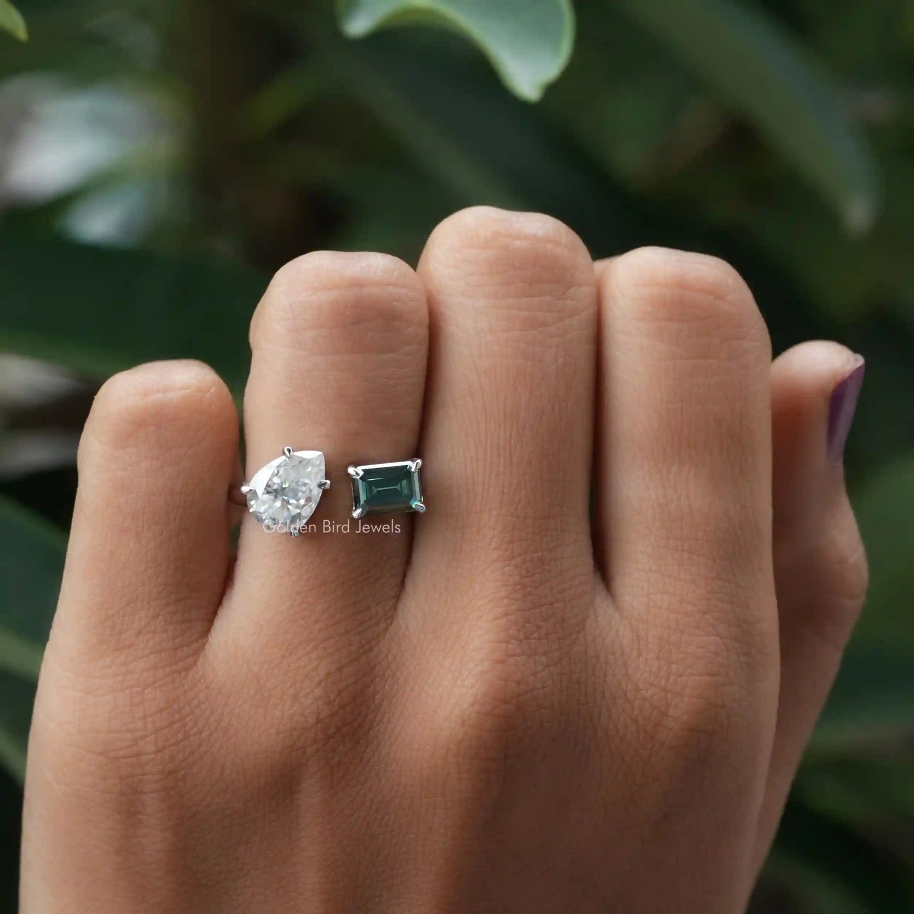 [In Finger a Moissanite Engagement Ring Made Of Pear And Radiant Cut Stone]-[Golden Bird Jewels]