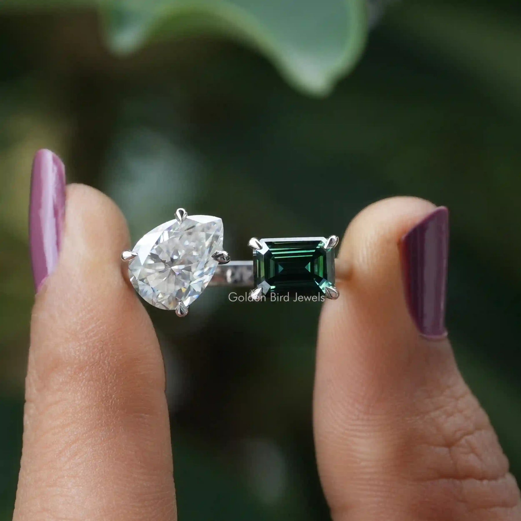 [In Fingers a 1.90 CT Emerald And 1.25 CT Pear Moissanite Engagement Ring]-[Golden Bird Jewels]
