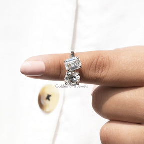 In finger front view of Emerald And Round Cut Moissanite Ring In White Gold