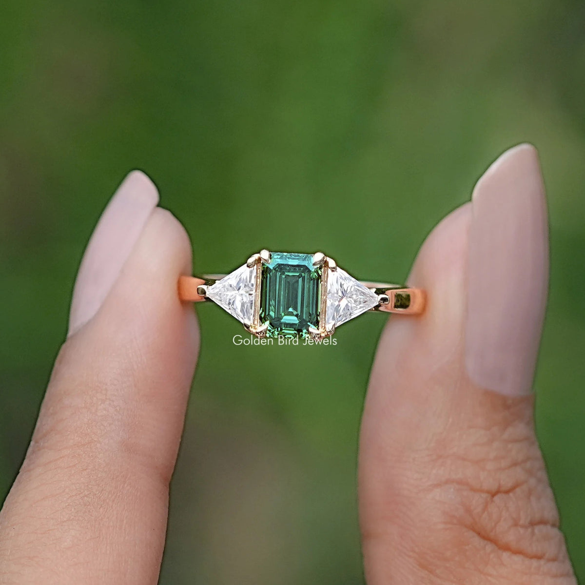 Emerald And Triangle Moissanite Three Stone Ring