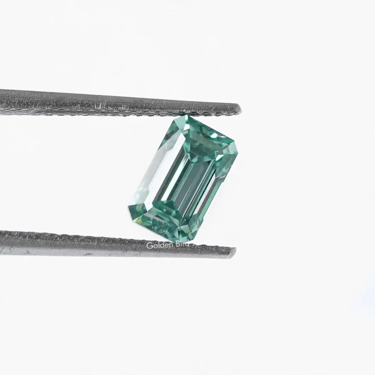 View Of Dark Green Emerald Cut Loose Stone