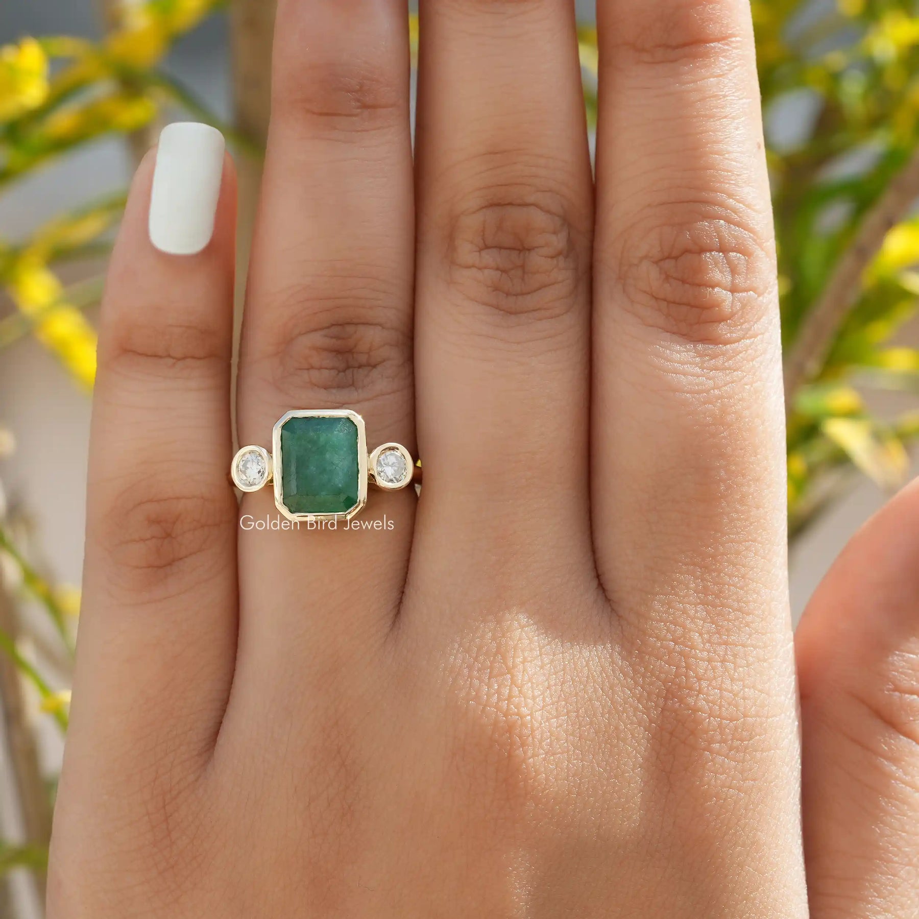 [This emerald cut moissanite ring set in bezel setting]-[Golden Bird  Jewels]