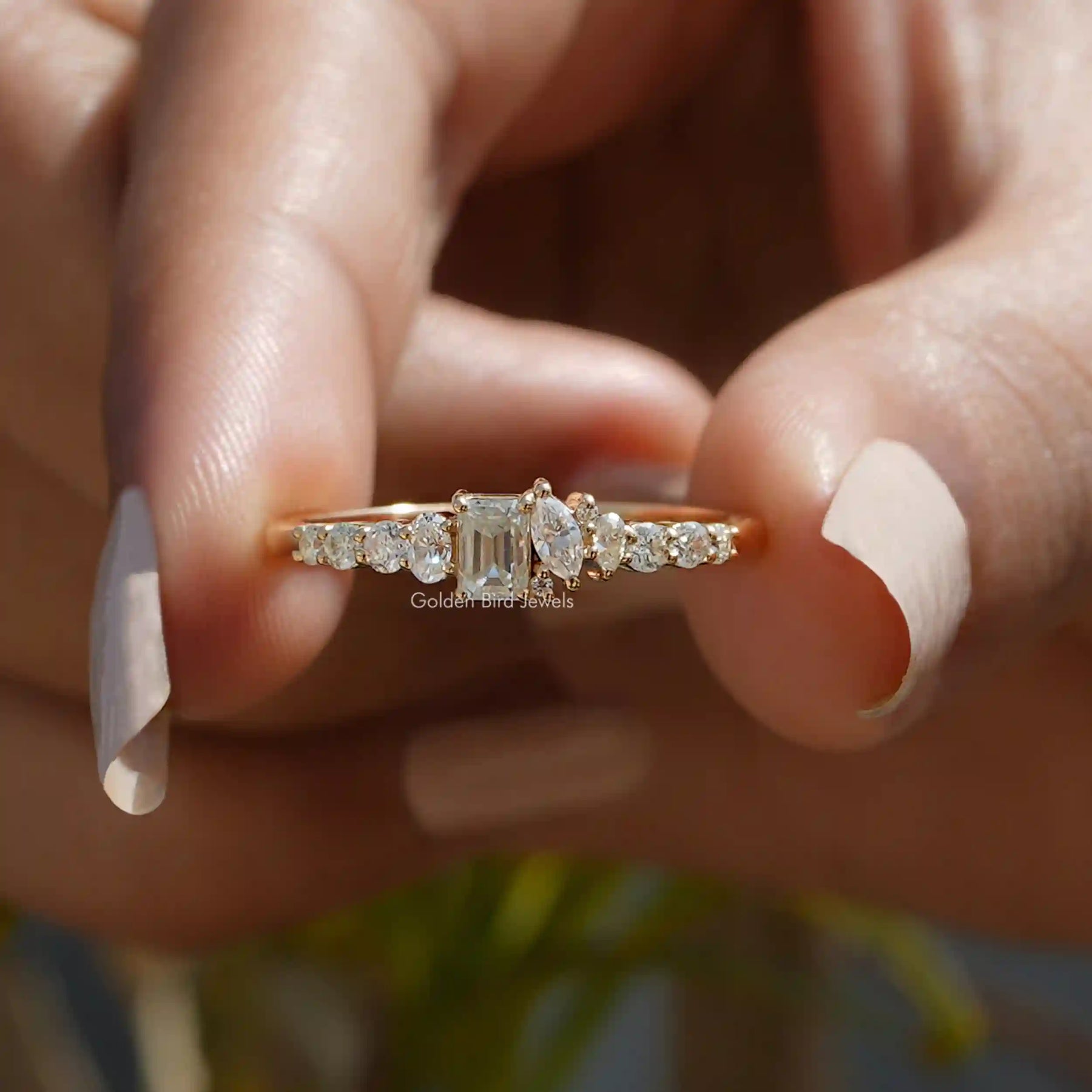 [Front view of emerald cut moissanite half eternity band]-[Golden Bird Jewels]