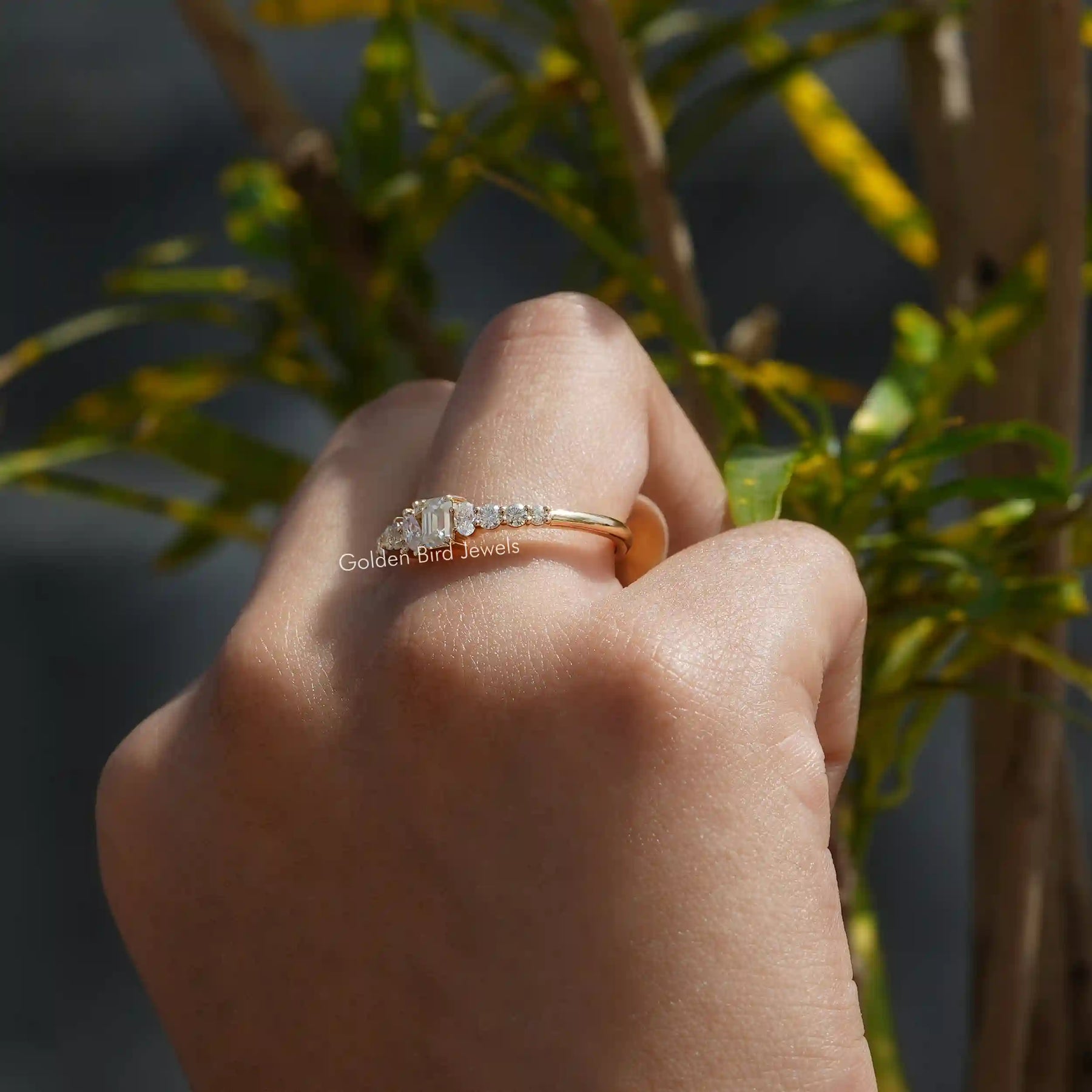 [In finger front view of multi stone half eternity band crafted with 14k yellow gold]-[Golden Bird Jewels]
